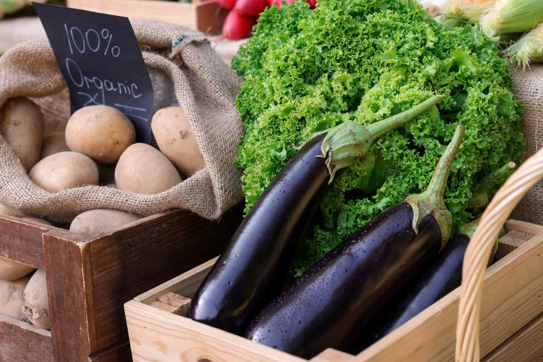 Organic fruit and veg displayed on the shelf.